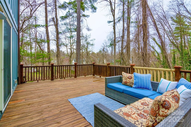 wooden deck featuring an outdoor hangout area