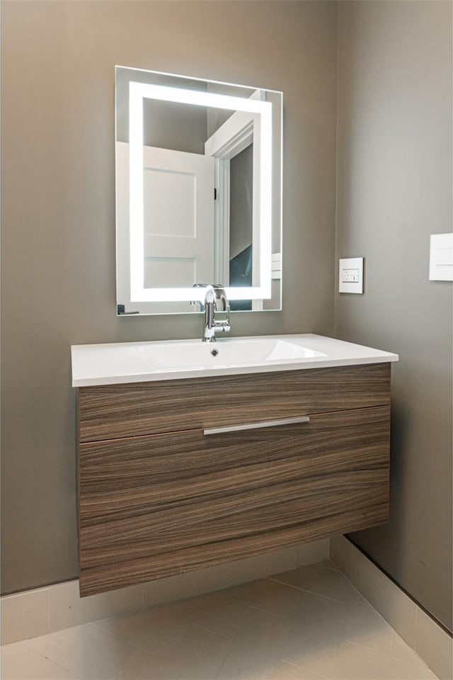 bathroom featuring tile patterned floors and vanity