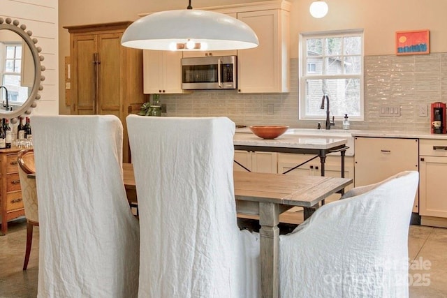 dining room with light tile patterned flooring