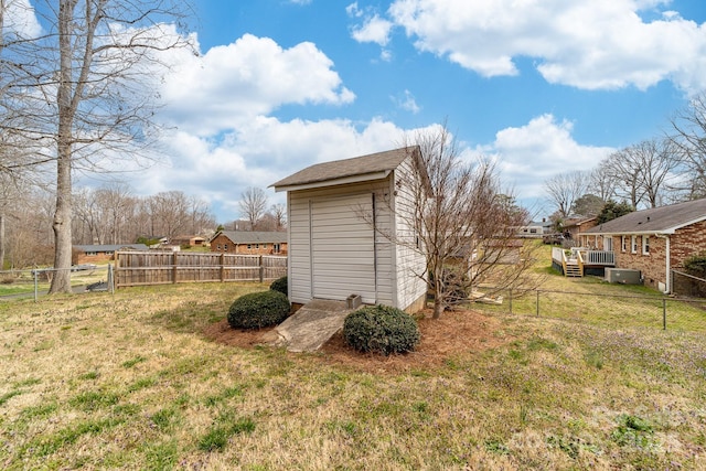 view of shed featuring a fenced backyard