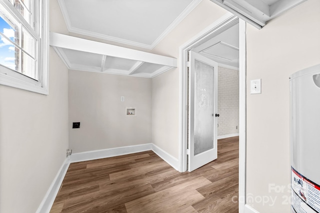 laundry room featuring wood finished floors, baseboards, laundry area, washer hookup, and gas water heater