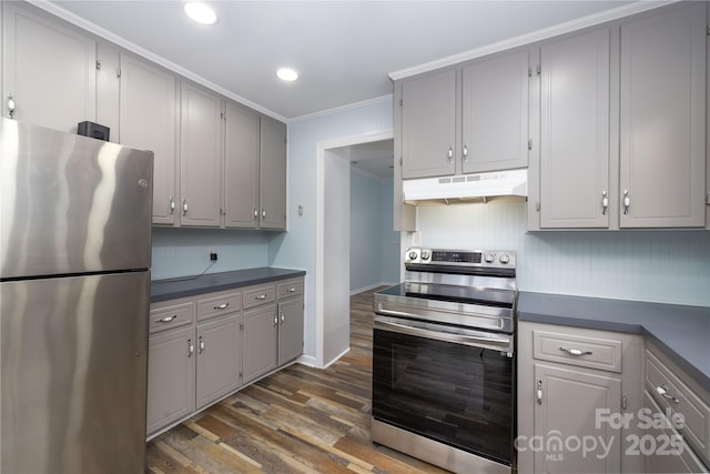 2005 Douglas Rd, Lancaster, SC 28720 - kitchen featuring dark countertops, gray cabinets, under cabinet range hood, and stainless steel appliances