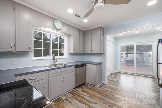 2005 Douglas Rd, Lancaster, SC 28720 - kitchen featuring dishwasher, gray cabinets, visible vents, and a sink