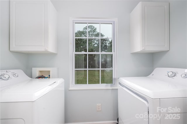 2005 Douglas Rd, Lancaster, SC 28720 - washroom with washing machine and clothes dryer and cabinet space