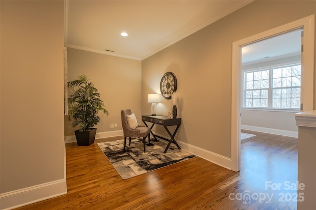 interior space featuring visible vents, baseboards, ornamental molding, recessed lighting, and wood finished floors