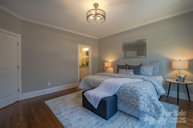 bedroom with crown molding, baseboards, and wood finished floors