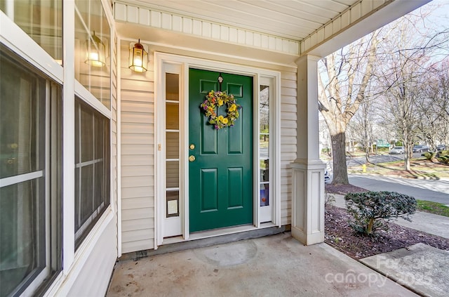 entrance to property with a porch