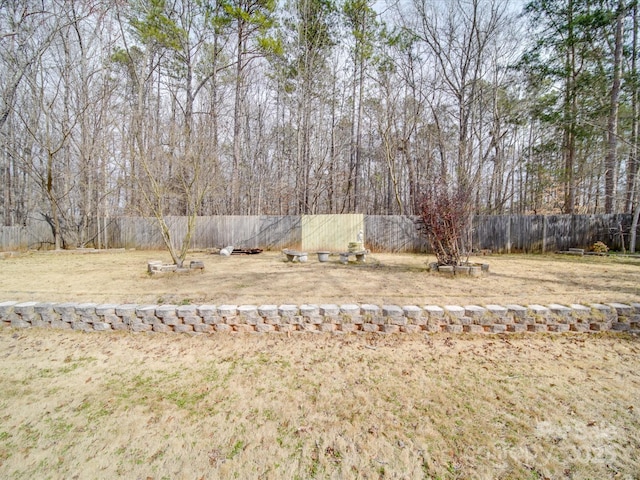 view of yard featuring fence