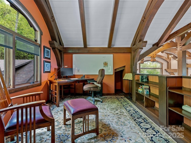 office area with vaulted ceiling with beams