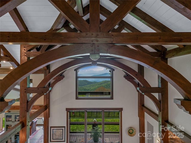 interior details with beam ceiling and arched walkways