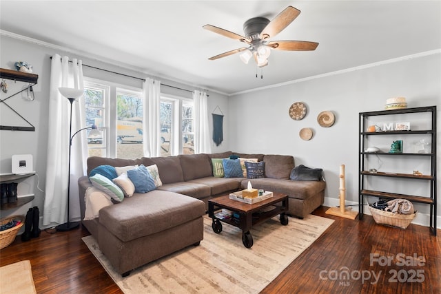 living area with ceiling fan, baseboards, hardwood / wood-style floors, and crown molding