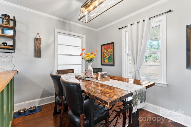 dining space with baseboards, dark wood-style floors, and ornamental molding