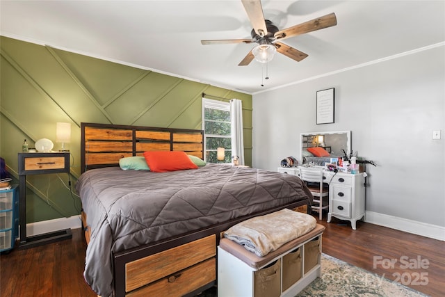 bedroom with baseboards, a ceiling fan, wood finished floors, and crown molding