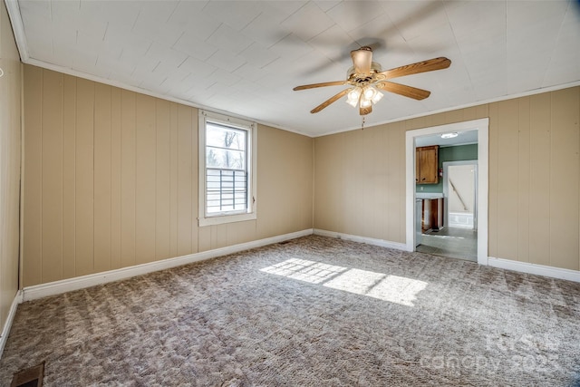 36 Brookline St, Great Falls, SC 29055 - carpeted spare room featuring visible vents, baseboards, ornamental molding, and a ceiling fan
