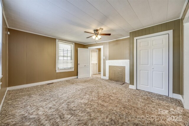 36 Brookline St, Great Falls, SC 29055 - unfurnished bedroom featuring crown molding, a fireplace, a closet, and carpet floors