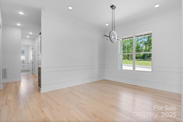 4227 Holly Cir NE, Conover, NC 28613 - unfurnished dining area featuring visible vents, baseboards, a notable chandelier, light wood-style floors, and recessed lighting