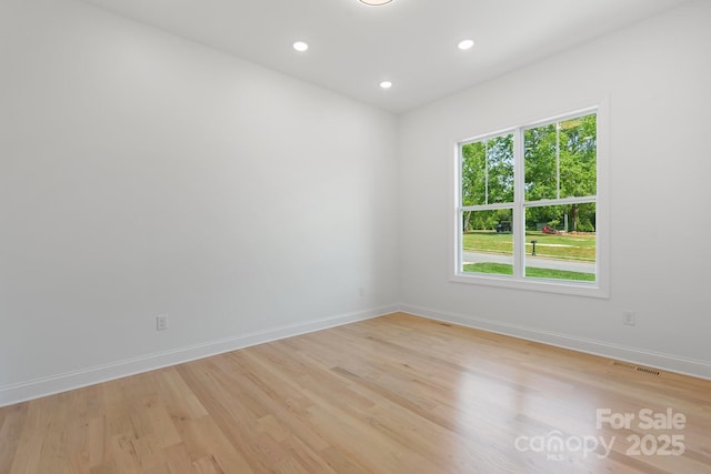 4227 Holly Cir NE, Conover, NC 28613 - spare room with light wood-style floors, baseboards, recessed lighting, and visible vents