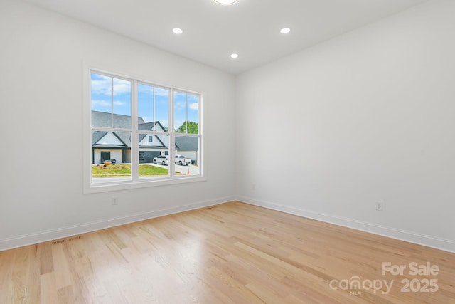4227 Holly Cir NE, Conover, NC 28613 - spare room with recessed lighting, baseboards, visible vents, and light wood-style floors