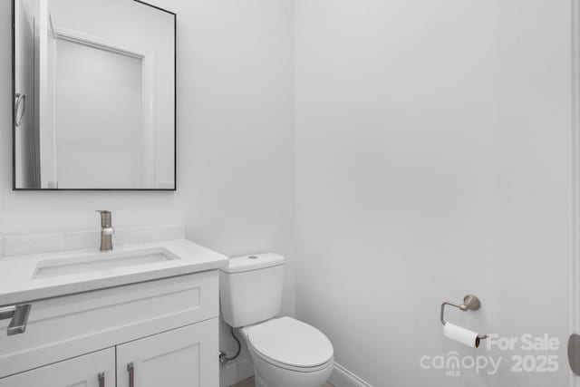 4227 Holly Cir NE, Conover, NC 28613 - half bathroom with toilet, baseboards, and vanity