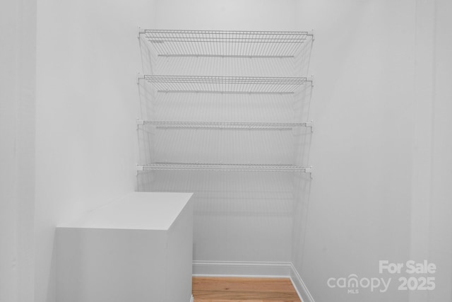 4227 Holly Cir NE, Conover, NC 28613 - spacious closet with wood finished floors