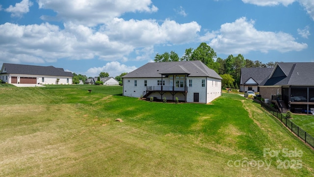 4227 Holly Cir NE, Conover, NC 28613 - rear view of property with a residential view, a wooden deck, stairway, fence, and a yard