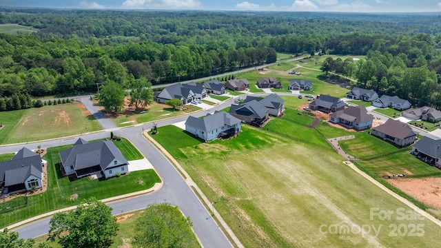 4227 Holly Cir NE, Conover, NC 28613 - birds eye view of property with a residential view and a wooded view
