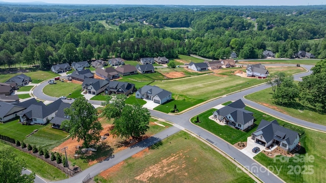 4227 Holly Cir NE, Conover, NC 28613 - drone / aerial view with a residential view and a wooded view