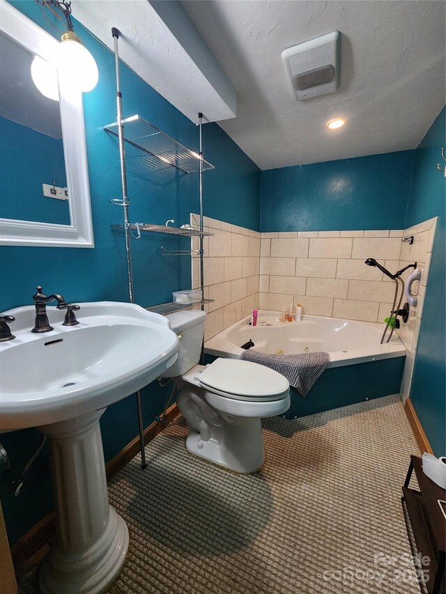 full bath featuring a bath, baseboards, visible vents, tile patterned floors, and toilet