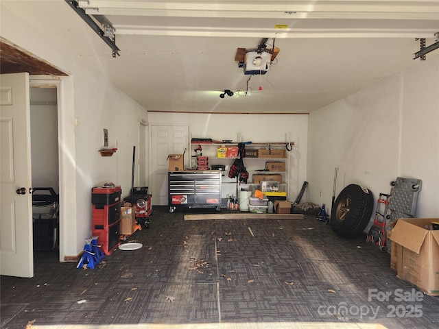 garage featuring a garage door opener