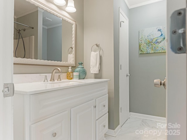 bathroom with vanity, baseboards, marble finish floor, and ornamental molding