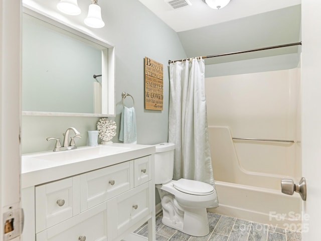 full bath featuring visible vents, toilet, lofted ceiling, shower / bath combo, and vanity