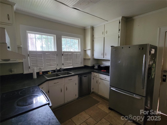 kitchen with dishwashing machine, range hood, freestanding refrigerator, white cabinets, and a sink