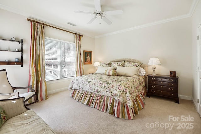 bedroom featuring baseboards, visible vents, carpet floors, and ornamental molding