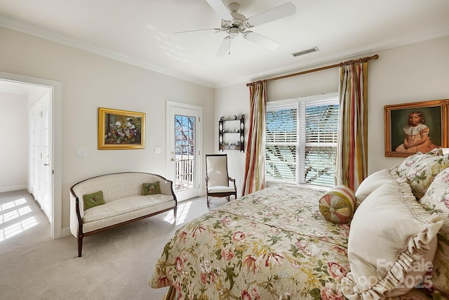 bedroom with visible vents, access to outside, carpet floors, crown molding, and ceiling fan