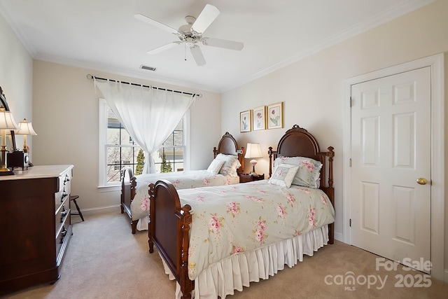 bedroom featuring visible vents, light colored carpet, baseboards, and ornamental molding