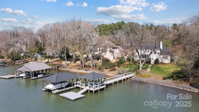 dock area featuring a water view and boat lift