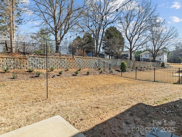 view of yard with fence