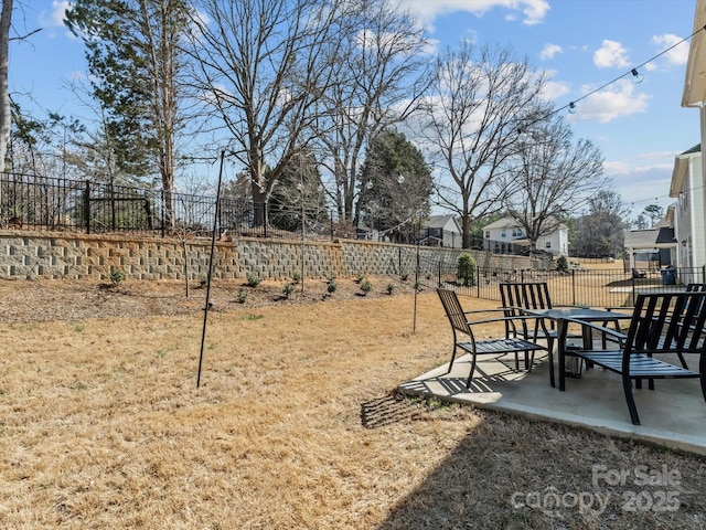 view of yard with a patio area and fence