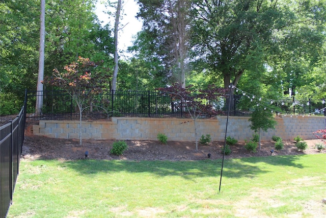 view of yard with fence