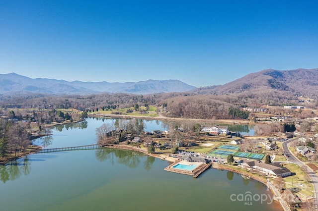 bird's eye view with a water and mountain view