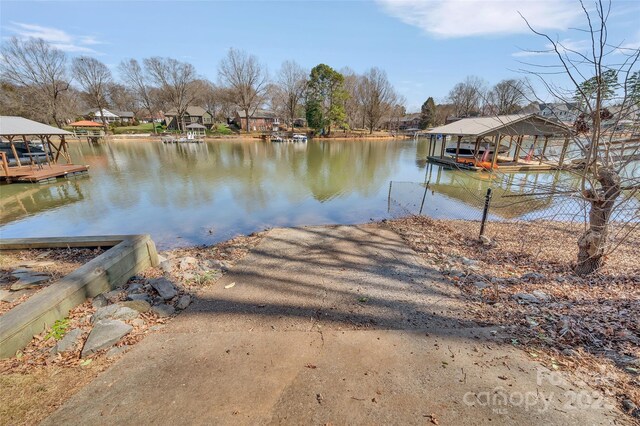 dock area with a water view