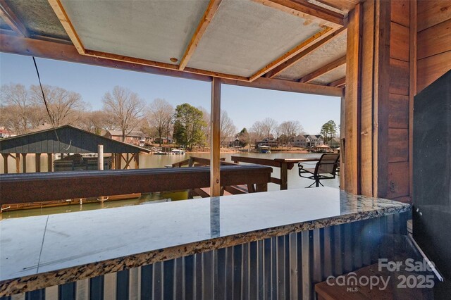 exterior space with a water view