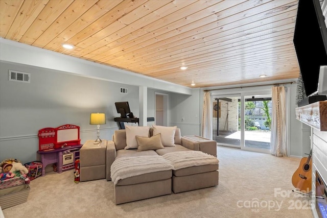 living area featuring wood ceiling, recessed lighting, carpet, and visible vents