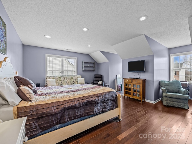 bedroom with dark wood-style floors, baseboards, lofted ceiling, recessed lighting, and a textured ceiling