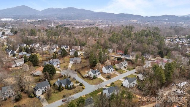 aerial view featuring a mountain view and a residential view