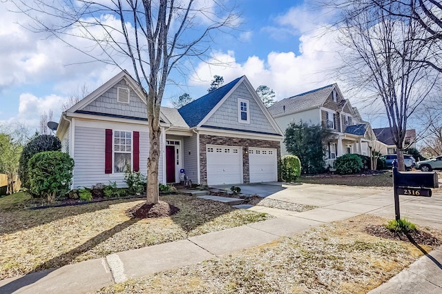 view of front of house with a garage and driveway