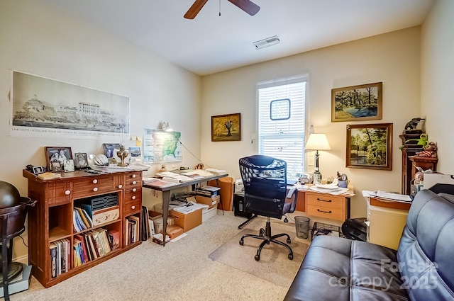 office space featuring visible vents, carpet, and ceiling fan