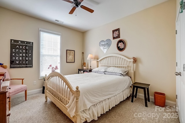 bedroom featuring visible vents, carpet flooring, a ceiling fan, and baseboards