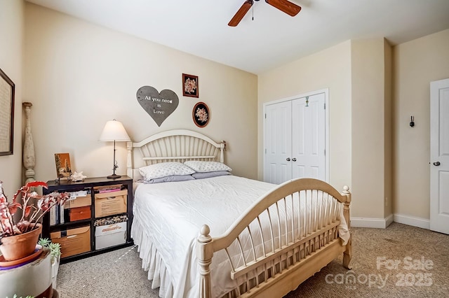 bedroom featuring a ceiling fan, baseboards, a closet, and carpet floors