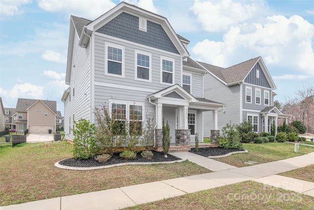 view of front of property featuring cooling unit and a front yard